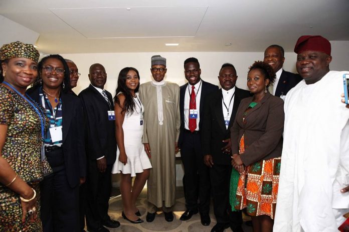President Buhari with some of the selected US-based Nigerian professionals at the New York meeting. Far right is Governor Ambode of Lagos State and far left, Abike Dabiri-Erewa, Senior Special Assistant to the President on Diaspora Matters and International Relations  / © NAN